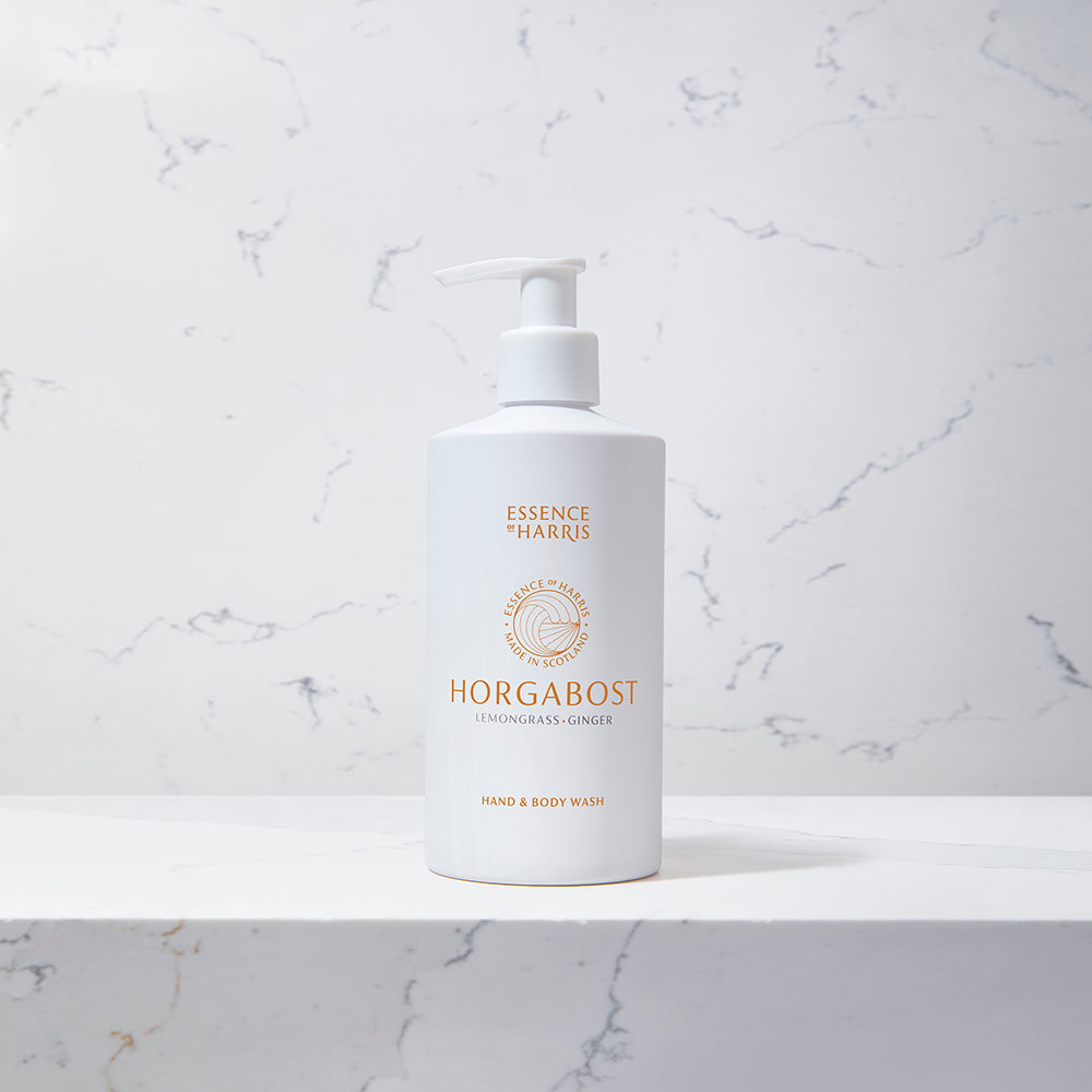 Horgabost, lemongrass and ginger hand and body wash in white bottle on a marble background.