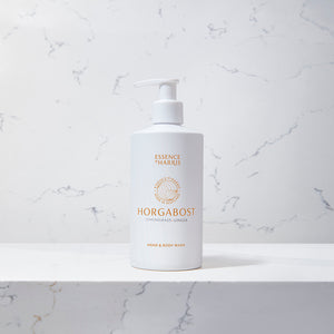 Horgabost, lemongrass and ginger hand and body wash in white bottle on a marble background.