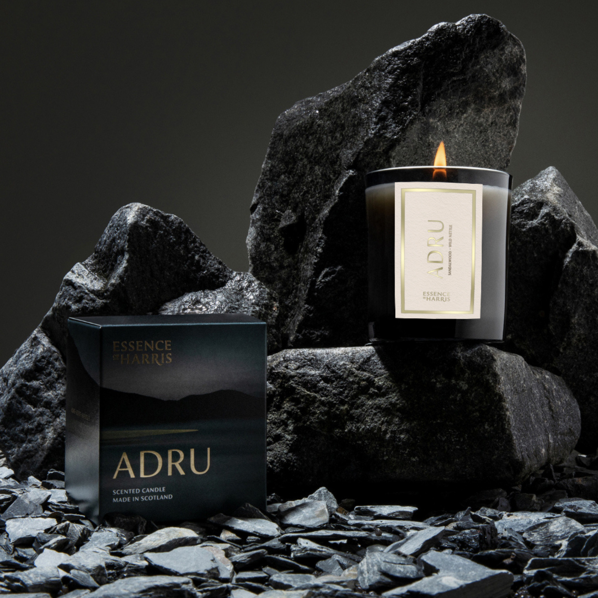 Essence of Harris Adru sandalwood and wild nettle soy wax candle in dark candle glass with island inspired candle box