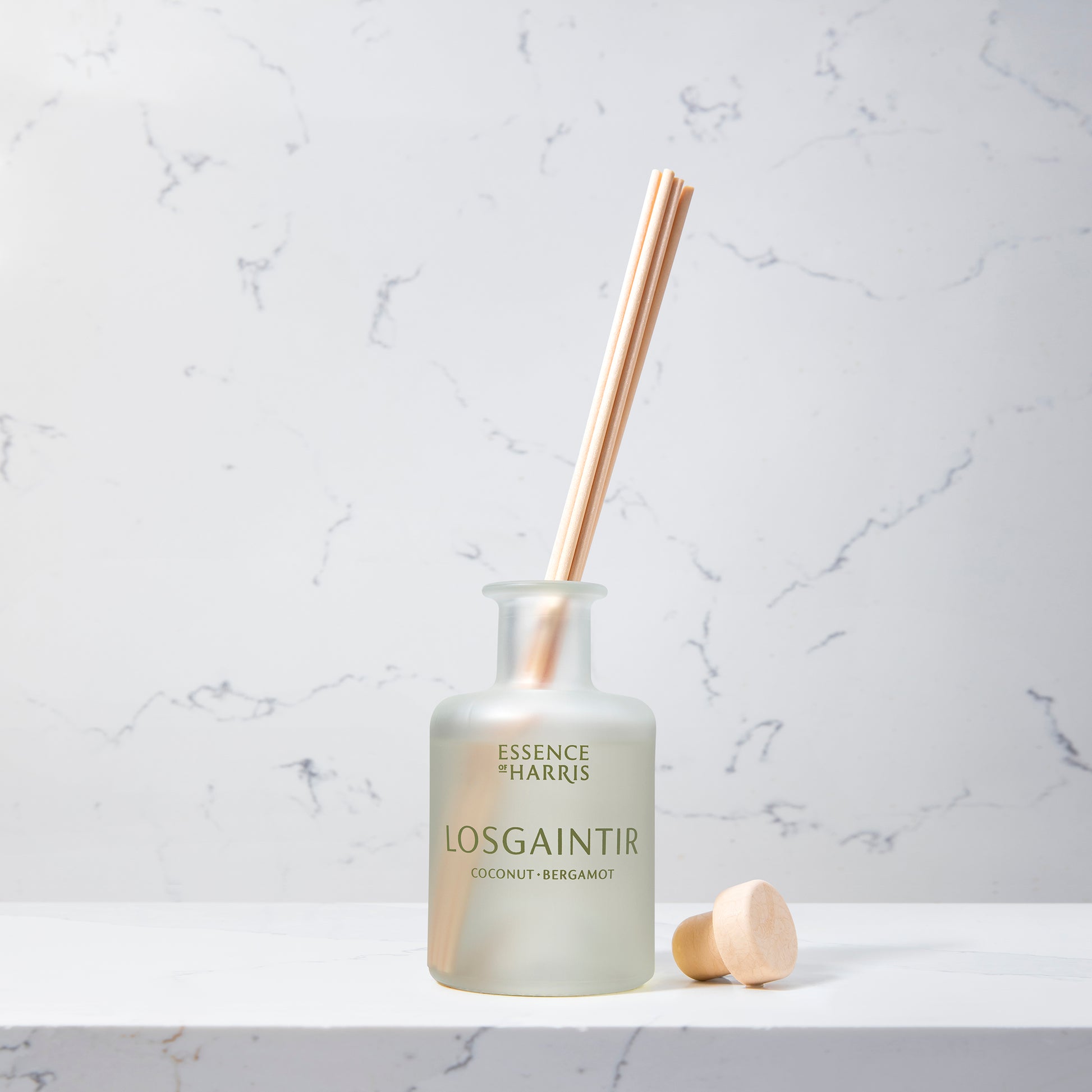 Essence of Harris Losgaintir, coconut, bergamot & vanilla reed diffuser in frosted glass vessel with natural reeds