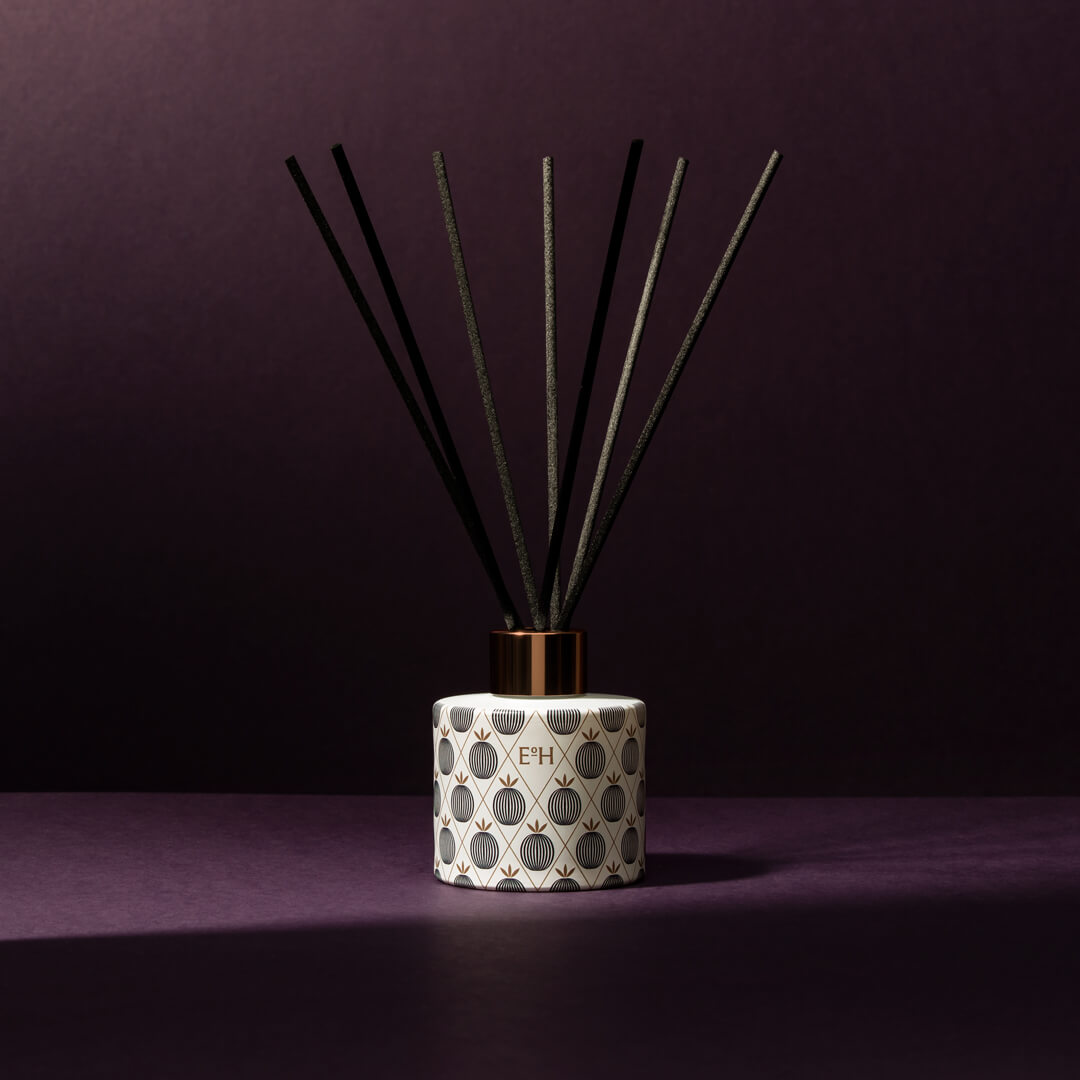 Spiced plum christmas reed diffuser with festive pattern
